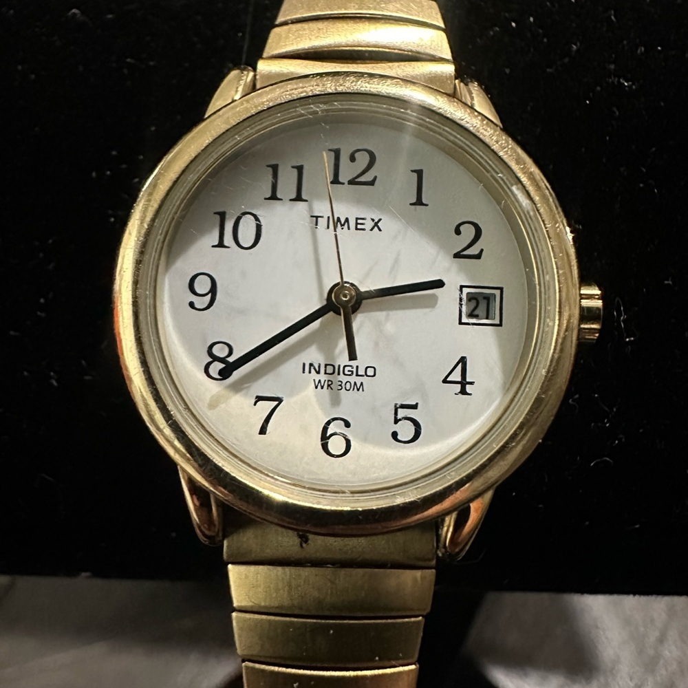 Timex Gold Watch with White Face